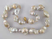 Appraisal: A Baroque South Sea cultured pearl necklace with a yellow