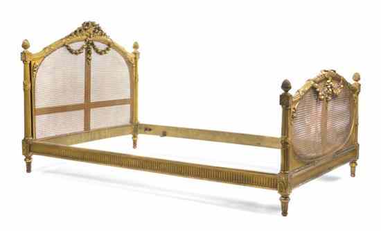 Appraisal: A Louis XVI Style Giltwood Bed having a carved basket