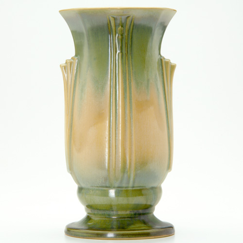 Appraisal: ROSEVILLE Russco vase with flared rim and buttressed handles Three