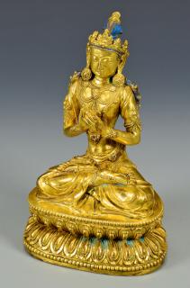 Appraisal: Gilt Buddhist Bronze Seated Sculpture Asian possibly Tibetan gilt bronze