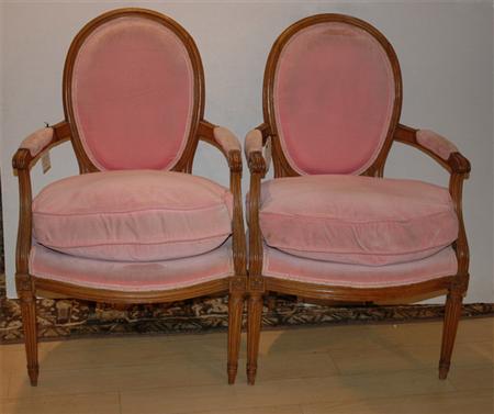 Appraisal: Pair of Louis XVI Style Beechwood Upholstered Fauteuils Estimate -