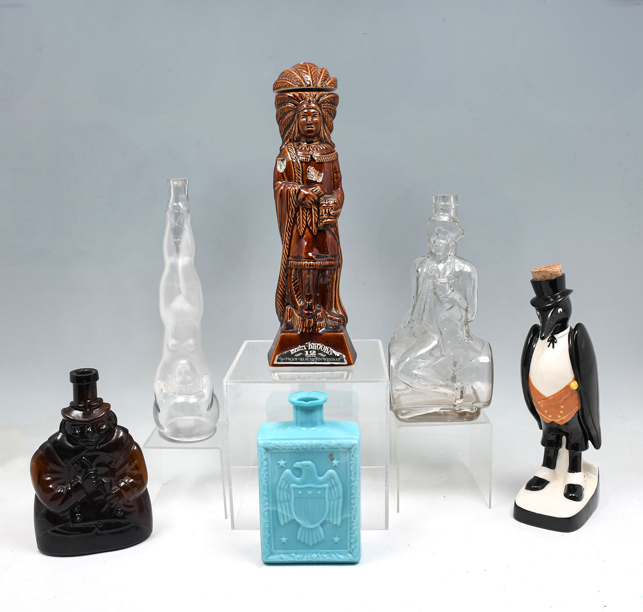 Appraisal: PC PORCELAIN GLASS FIGURAL LIQUOR DECANTERS Comprising - ''Old Crow''