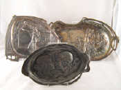 Appraisal: Three pewter dishes An Art Nouveau pewter dish with two