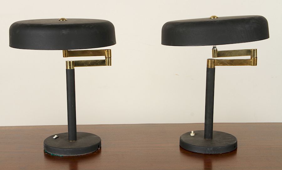 Appraisal: PAIR ITALIAN IRON BRONZE SWING ARM LAMPS A pair of