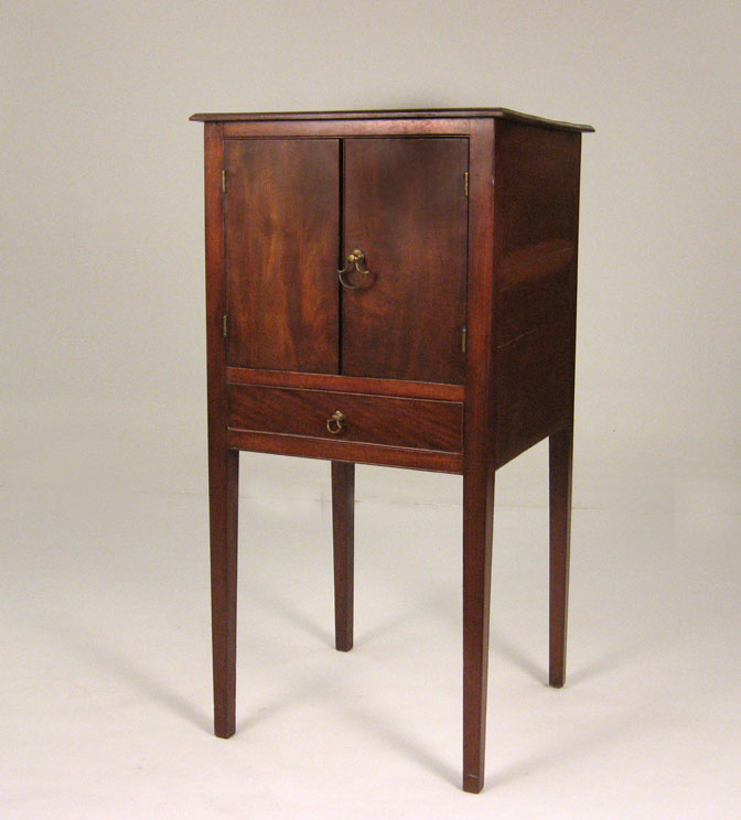 Appraisal: George III mahogany bedside table circa The rectangular top above