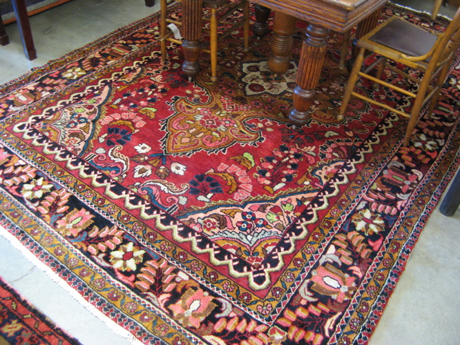 Appraisal: PERSIAN HAMADAN CARPET Hamadan tribal villages region floral and central