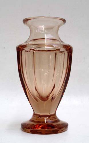 Appraisal: MOSER TRANSPARENT AMBER GLASS BOTTLE having octagonal formed body on