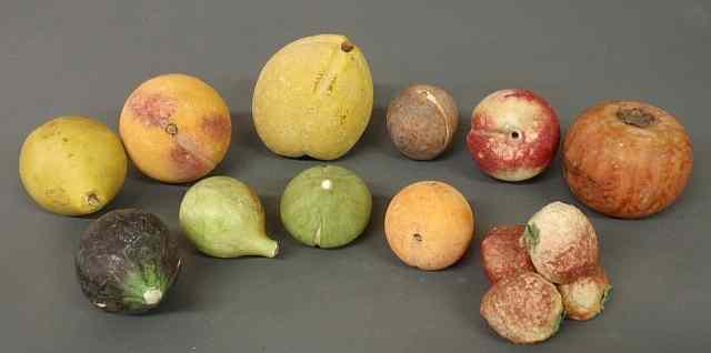 Appraisal: Group of eleven pieces of stone fruit- pear is h