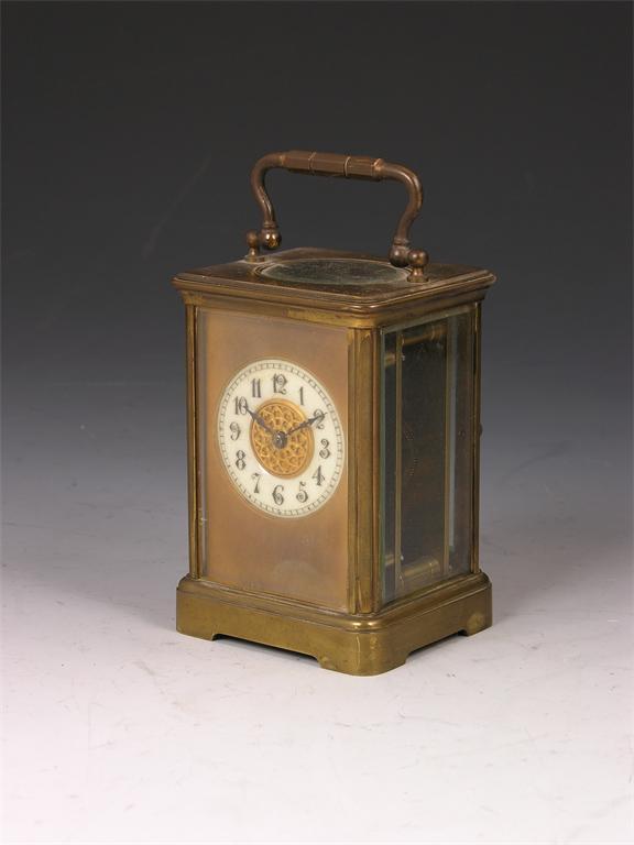 Appraisal: A French gilt brass corniche cased carriage timepiece