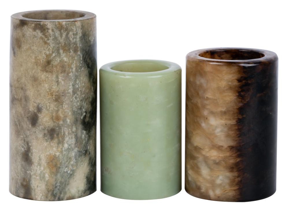 Appraisal: THREE CHINESE JADE CYLINDRICAL VASESeach of cylindrical form Provenance The