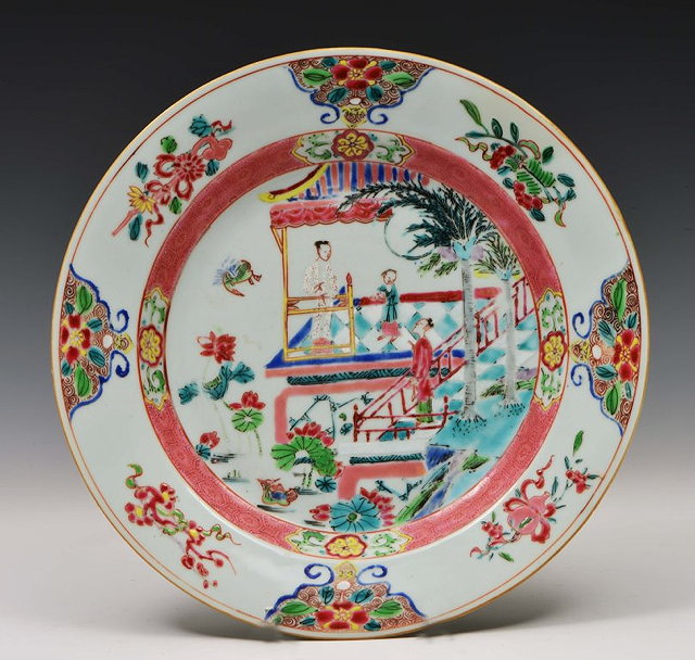 Appraisal: A CHINESE FAMILLE ROSE PLATE figures admiring a lotus pond