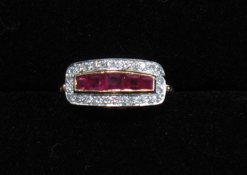 Appraisal: A RUBY AND DIAMOND DRESS RING of horizontal rectangular form