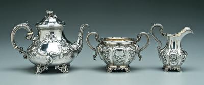 Appraisal: Three pieces English silver teapot with scroll and floral decoration