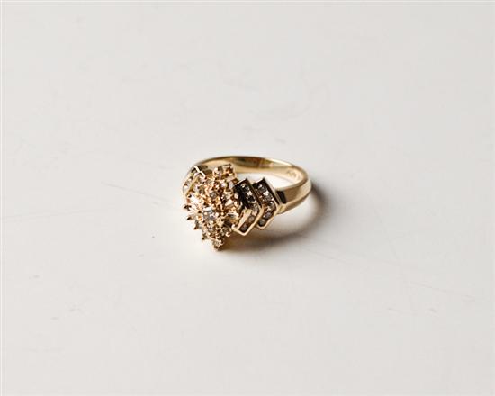 Appraisal: k Ring Diamond Yellow Gold Centering a raised Navette shaped