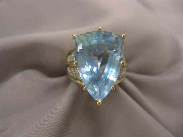 Appraisal: Blue Topaz Diamond Ring rich triangular gem weighing carats and