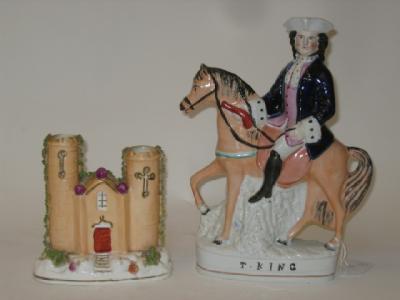 Appraisal: A STAFFORDSHIRE PORCELAIN FIGURE th century modelled as Tom King