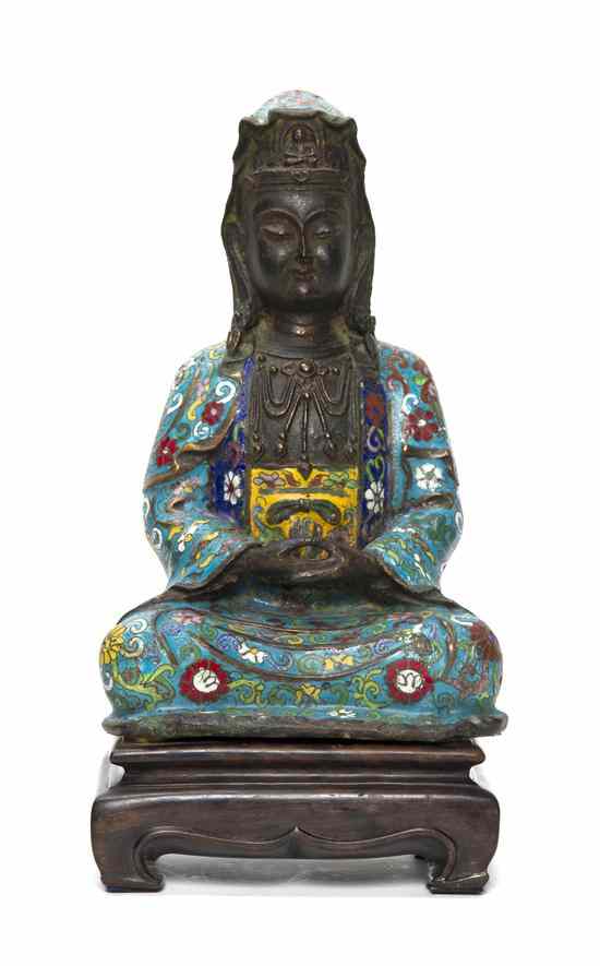 Appraisal: A Chinese Cloisonne Figure of Guanyin the deity depicted seated