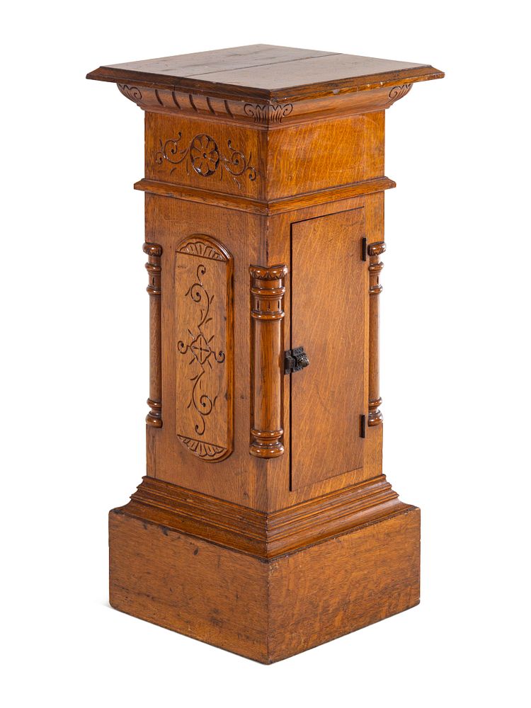 Appraisal: An Aesthetic Movement Carved Oak Pedestal An Aesthetic Movement Carved