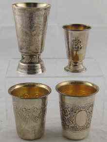 Appraisal: Two sterling silver beakers together with two grade silver beakers