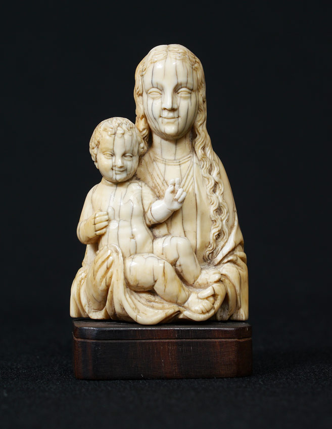 Appraisal: CONTINENTAL CARVED IVORY MADONNA CHILD European carved ivory figural group