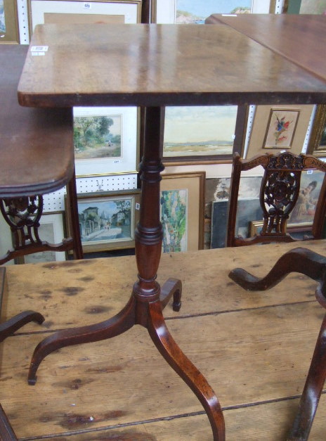 Appraisal: A Regency mahogany rectangular table with a vase turned support