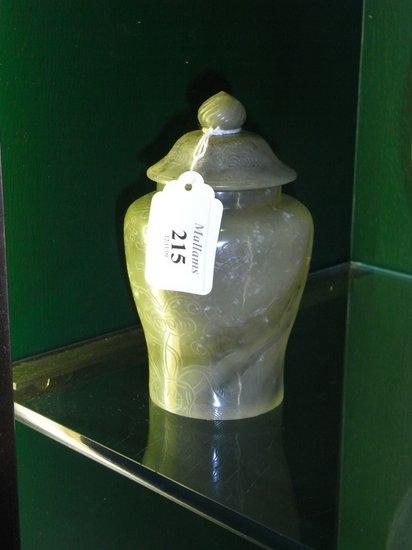 Appraisal: A SMALL CHINESE GREEN JADE VASE and cover Qing dynasty