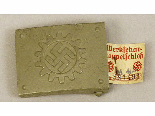 Appraisal: WW II German Belt Buckle swastika in gear wheel pattern