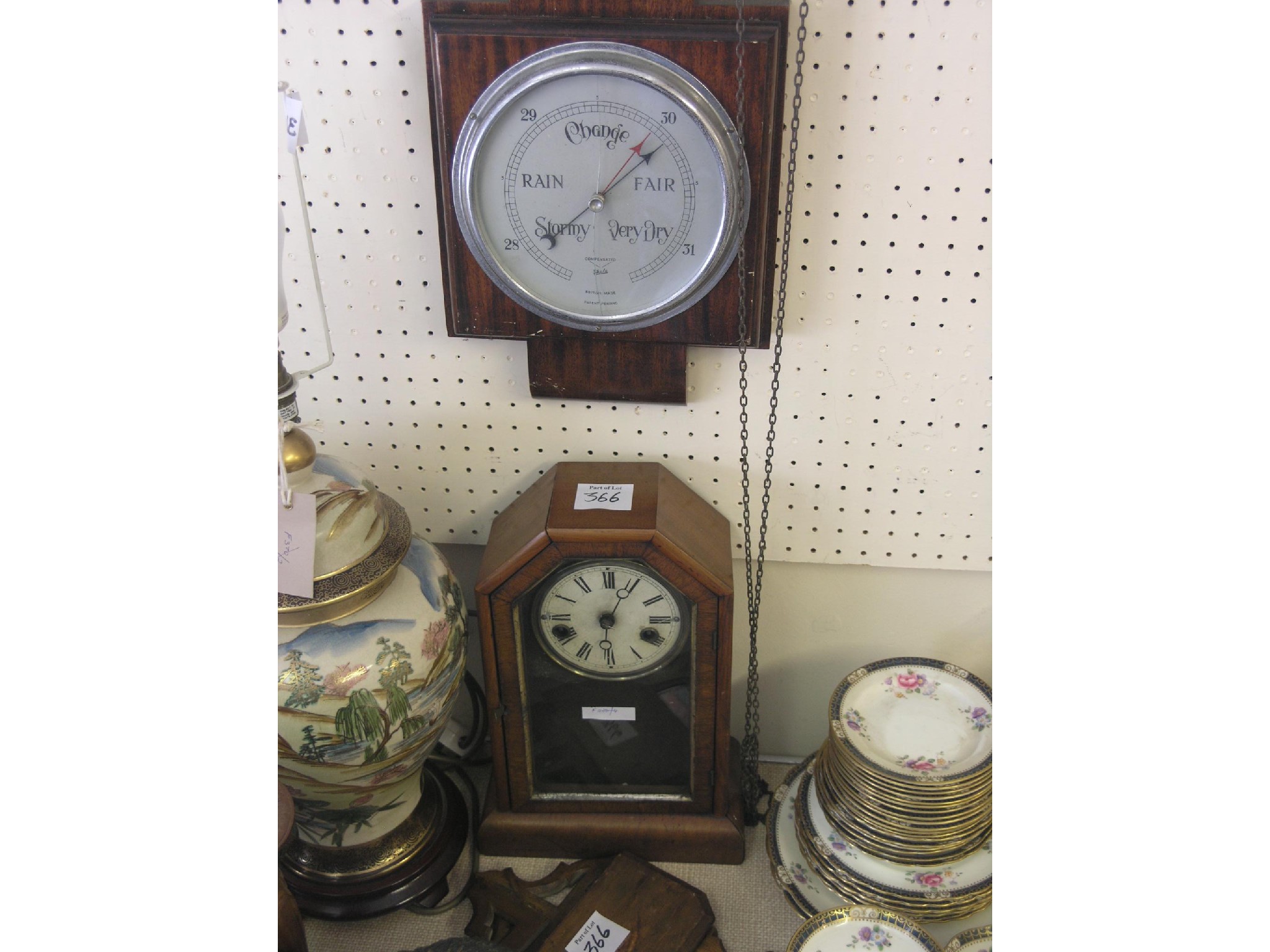 Appraisal: A th century American walnut mantel clock enclosed by arched