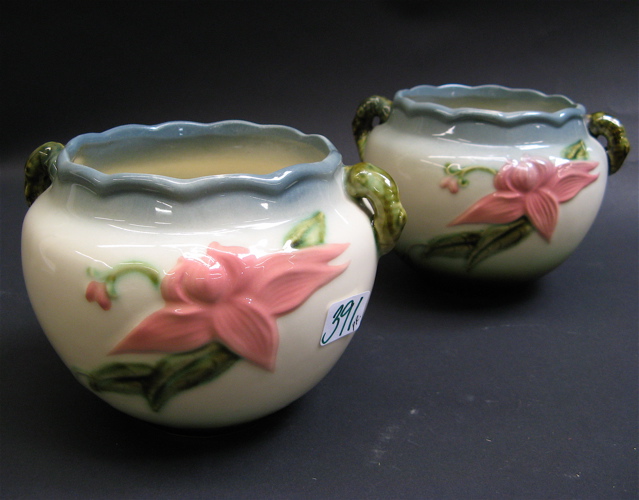 Appraisal: PAIR HULL GLAZED ART POTTERY PLANTERS rose colored Clematis flower