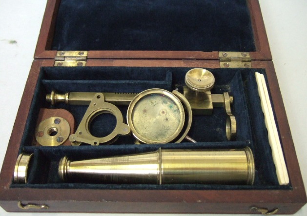 Appraisal: A mahogany cased botanist microscope early th century lenses lacking