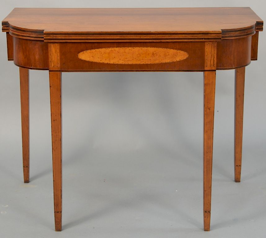 Appraisal: Federal cherry D shaped game table having oval panel inlay