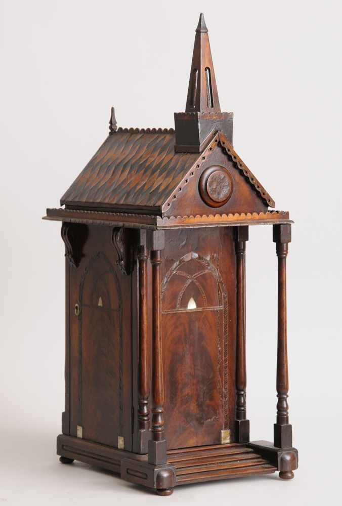 Appraisal: VICTORIAN CARVED AND INLAID PAVILLION-FORM COLLECTOR'S CABINET The tile-inlaid roof