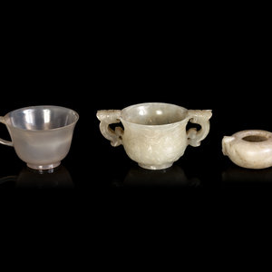 Appraisal: Three Chinese Jade Vessels TH- TH CENTURY comprising a pale