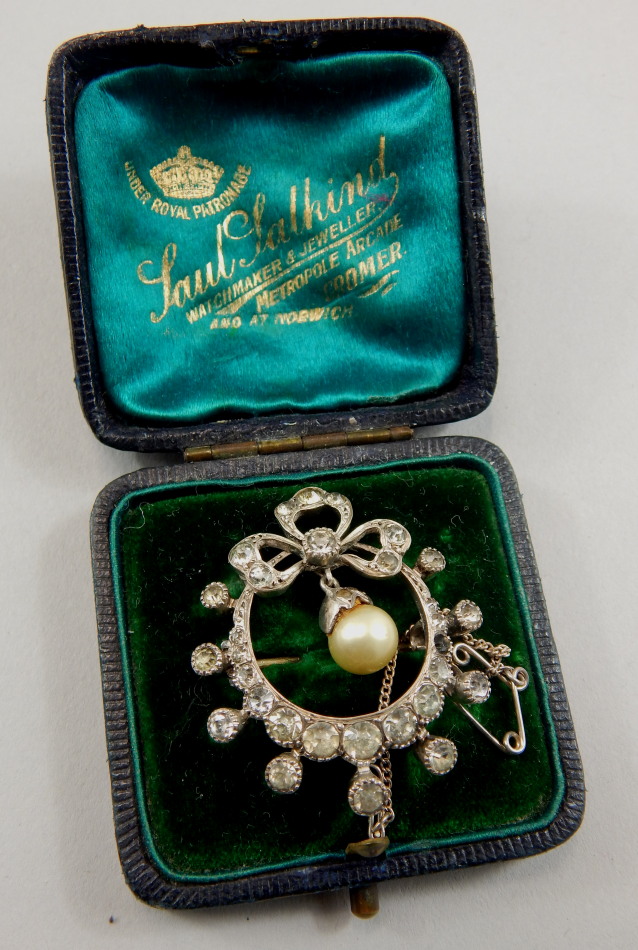 Appraisal: A Victorian silver costume brooch in a circular shape set