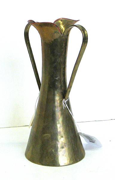 Appraisal: A Russian Art Nouveau hammered brass and copper two handled