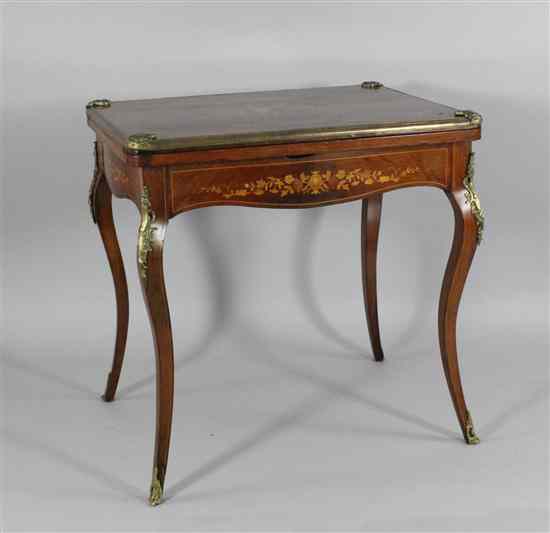 Appraisal: A th century Continental marquetry inlaid rosewood folding card table