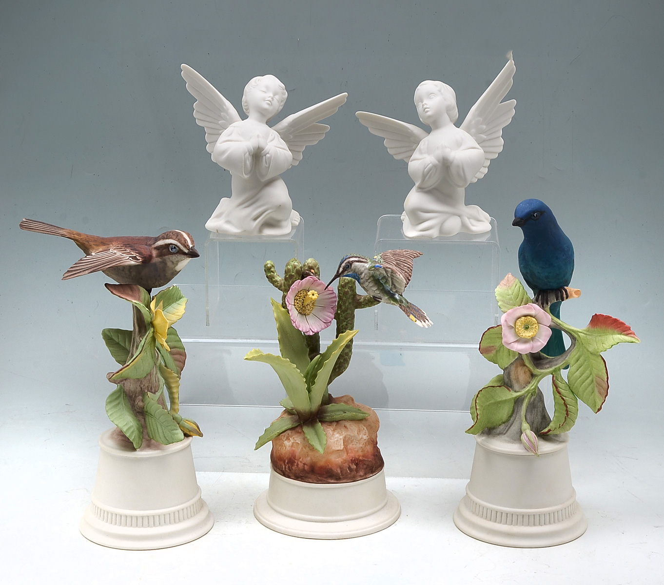 Appraisal: PC BOEHM BIRDS AND ANGELS COLLECTION Comprising - Bisque kneeling