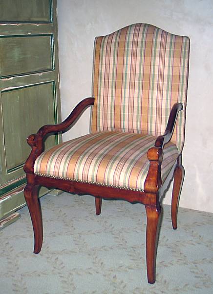 Appraisal: A pair of Regence style walnut armchairs height in width