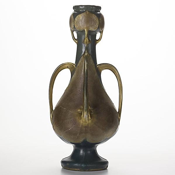 Appraisal: REISSNER STELLMACHER KESSELTall Amphora ceramic four-handled vase with leavesSee condition