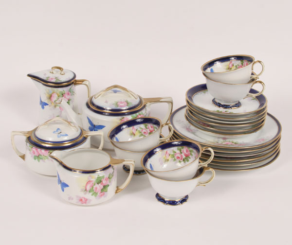 Appraisal: Tea dessert set hand painted Nippon butterflies cobalt and gilt