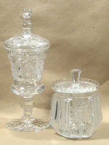 Appraisal: A cut glass biscuit jar together with thistle cup and