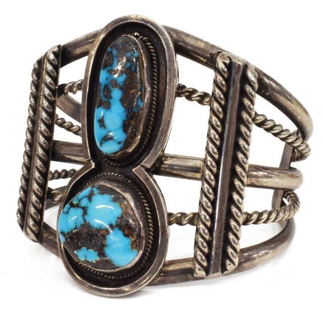 Appraisal: Native American silver content unknown cuff bracelet two turquoise cabochons