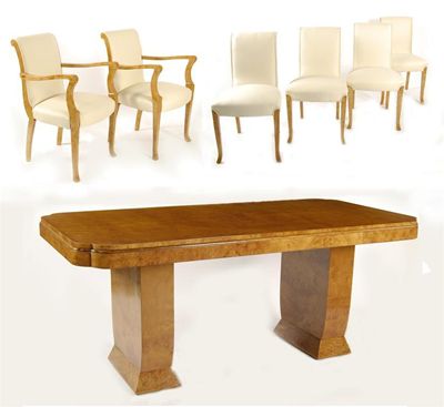 Appraisal: An Art Deco burr maple dining table and six chairs