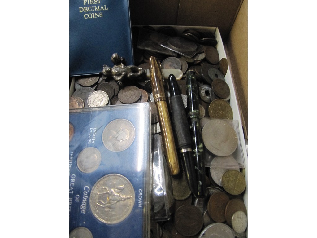 Appraisal: A box of assorted coins a baby rattle a silver