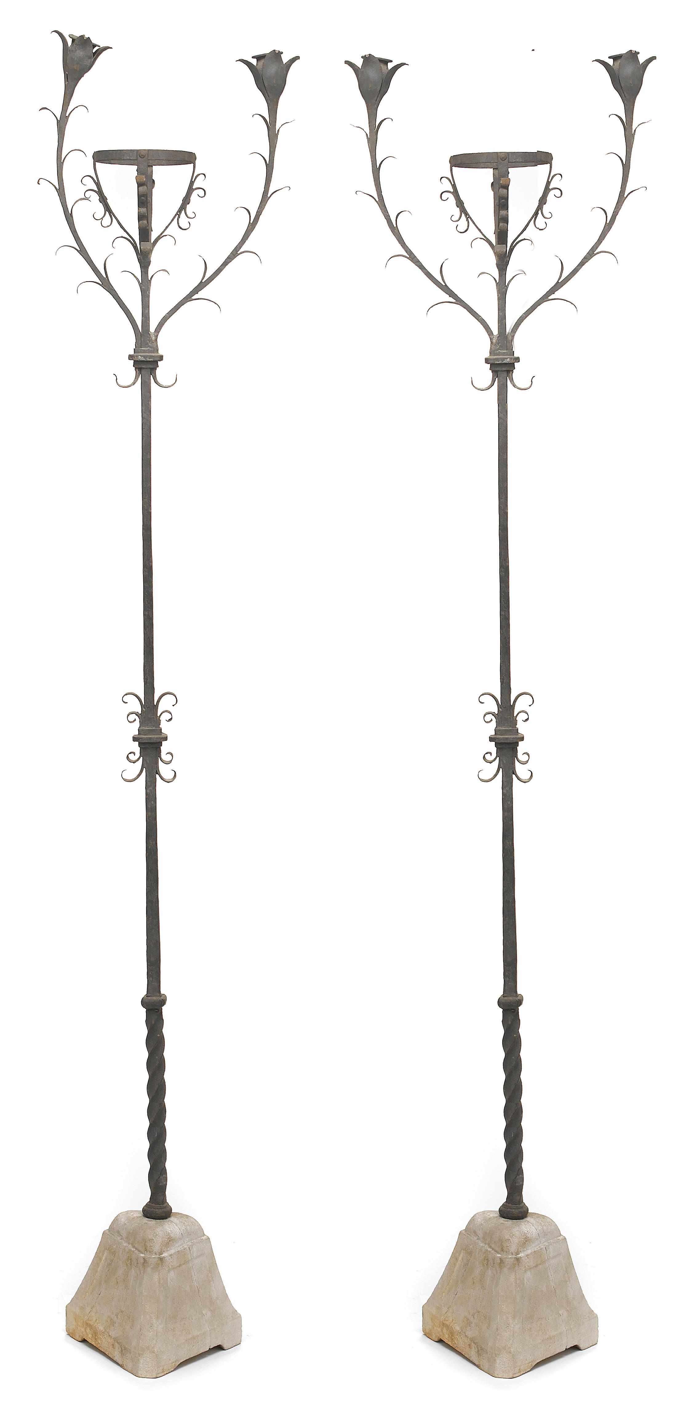 Appraisal: A pair of Renaissance Revival wrought iron floor lamps th