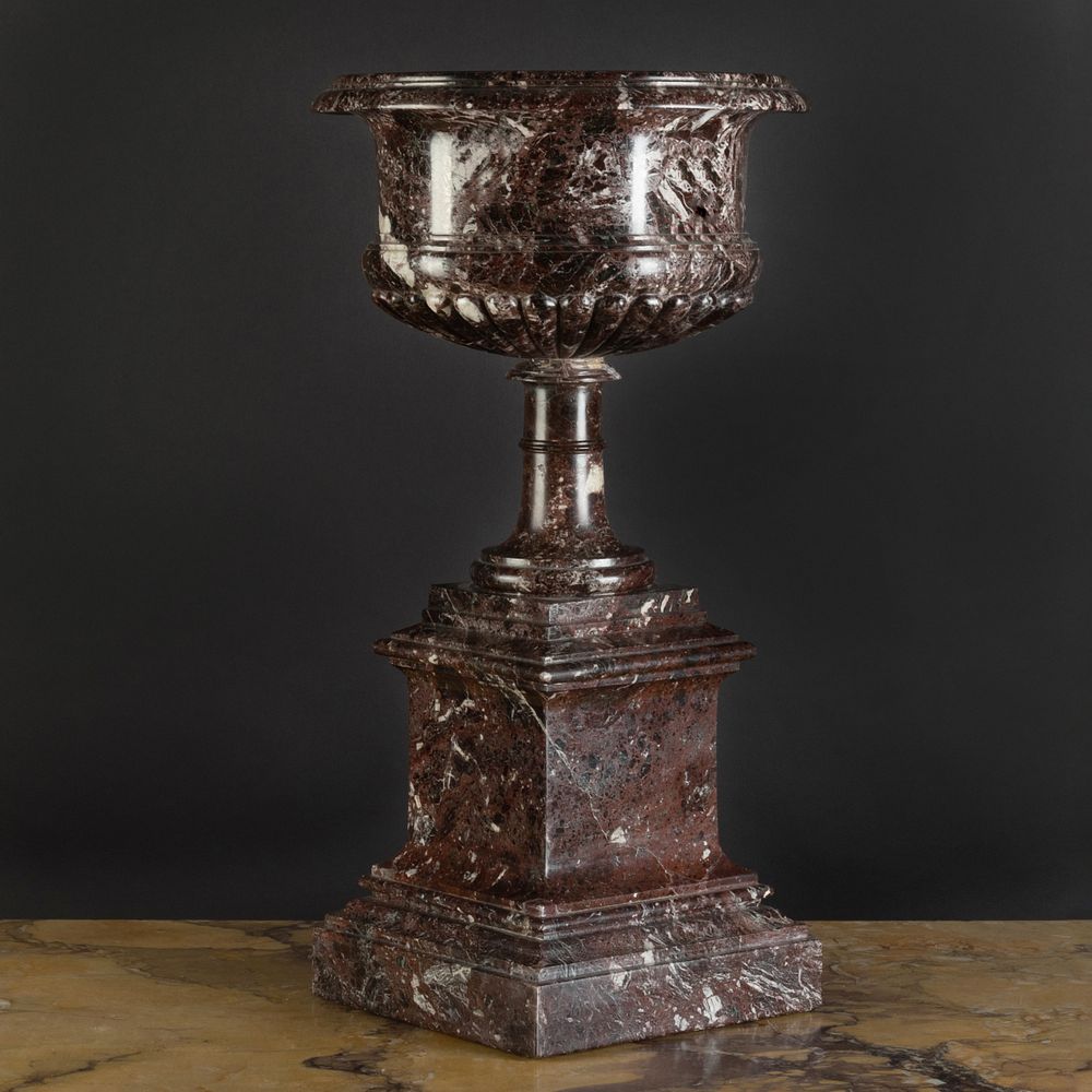 Appraisal: Large Brown Marble Urn on Pedestal The semi-gadrooned urn raised