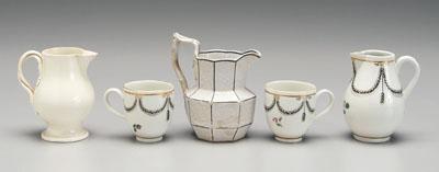 Appraisal: Five pieces English ceramics creamware pitcher with double strap handle