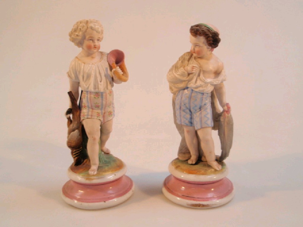 Appraisal: A pair of late thC French bisque figures modelled as