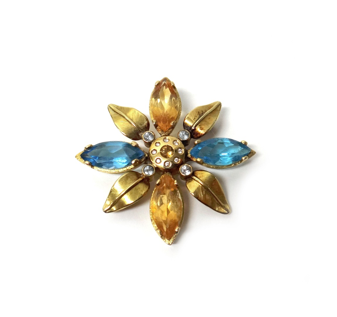 Appraisal: A gold diamond citrine and pale blue gem set pendant