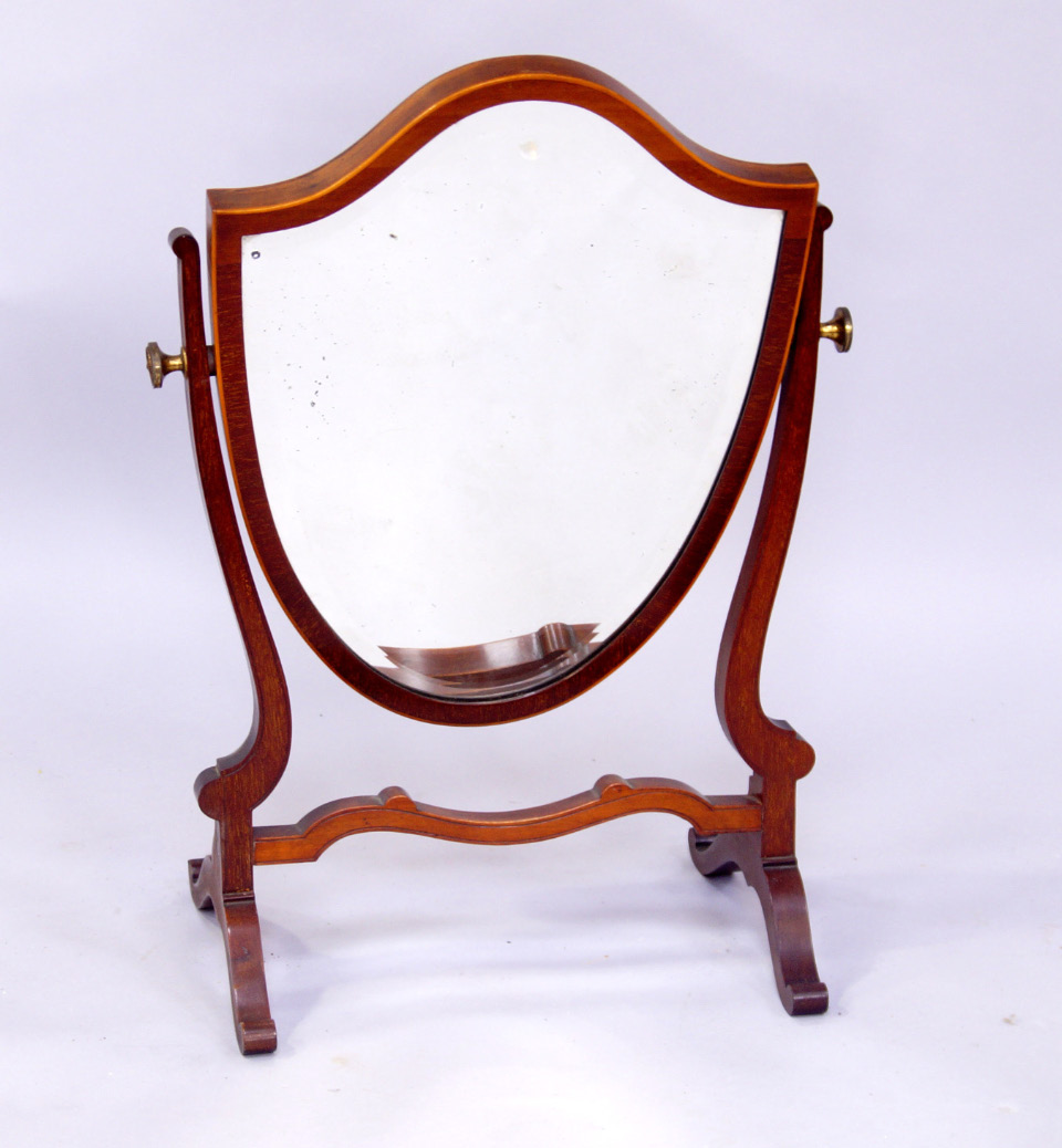 Appraisal: A late thC mahogany and boxwood strung table mirror with